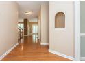 Welcoming hallway with gleaming hardwood floors and staircase views at 2810 Stillwater Park Dr, Marietta, GA 30066