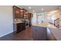 Well-equipped kitchen featuring granite countertops, stainless steel appliances, and ample cabinet space at 10 Edgewater Ct, Covington, GA 30016