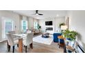Bright and inviting living room featuring stylish furniture, fireplace and a ceiling fan at 319 Overlook Rd, Covington, GA 30014