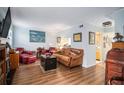 Cozy living room with hardwood floors, artwork, and comfortable seating at 3665 Essex Ave # 28, Atlanta, GA 30339