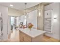 Bright condo featuring modern living space with open floor plan, island and city view at 860 Peachtree Ne St # 1103, Atlanta, GA 30308