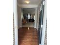 Inviting foyer with gleaming hardwood floors and an open view to the living area at 4036 Carlinswood Way, Stone Mountain, GA 30083