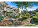 Well-maintained exterior with landscaped walkway leading to the entrance at 610 Mill Pond Se Dr, Smyrna, GA 30082