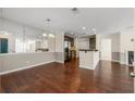 Bright open-concept living area with beautiful hardwood floors and ample space at 610 Mill Pond Se Dr, Smyrna, GA 30082