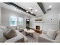 Comfortable living room showcasing a fireplace, ample seating, and stylish decor at 1045 Moreland Se Ave, Atlanta, GA 30316
