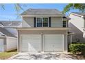 Charming home featuring a two-car garage and a welcoming exterior at 680 Barshay Dr, Covington, GA 30016