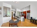 View of kitchen, with granite counters, and stainless appliances and eat-in table at 130 Arizona Ne Ave # 214, Atlanta, GA 30307