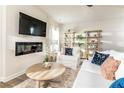 Inviting living room with a fireplace, comfortable seating, and stylish decor at 149 Weldon Rd, Mcdonough, GA 30253