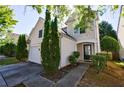 Charming two-story home with a well-maintained front yard and a two-car garage at 3226 Saville Sw St, Atlanta, GA 30331