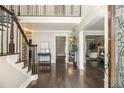 Inviting foyer with hardwood floors, staircase and views into living spaces at 5222 Camden Lake Nw Pkwy, Acworth, GA 30101