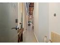 Hallway with modern decor and neutral colors, enhanced by natural light and leading to the living space at 170 Boulevard Se # 115E, Atlanta, GA 30312