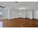 Well-lit open living space with gleaming hardwood floors and ample closet space at 3655 Habersham Ne Rd # B-254, Atlanta, GA 30305
