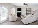 Comfortable living room boasts natural light, modern furnishings, and a fireplace at 1546 Silvaner Nw Ave # 20, Kennesaw, GA 30152