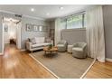 Cozy living room featuring hardwood floors, comfortable seating, and a bright, airy atmosphere at 880 Glendale Ne Ter # 9, Atlanta, GA 30308