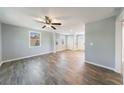 Spacious living room with sleek wood-look flooring, neutral paint, and ample natural light at 2077 Perkerson Rd, Atlanta, GA 30310
