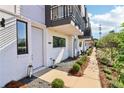 Exterior shot of modern townhomes showcasing well-maintained landscaping and inviting entrance ways at 443 Plateau Nw Pl, Atlanta, GA 30309