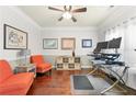 Inviting home office with hardwood floors, warm lighting, and comfortable seating at 3599 Bellmonte Dr, Atlanta, GA 30337