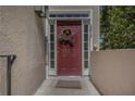 Inviting front door adorned with a wreath, complemented by sidelights and a welcome mat at 2518 Oakwood Se Way, Smyrna, GA 30080