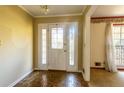 Entryway featuring a decorative glass door and chandelier lighting at 3670 Whirlaway Dr, Decatur, GA 30034