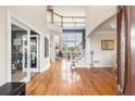 Grand foyer with hardwood floors, staircase, and soaring ceilings creating a welcoming entry at 482 Cooper Lake Se Rd, Smyrna, GA 30126