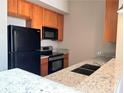 Modern kitchen with granite countertops and stainless steel appliances at 502 Pryor St # 207, Atlanta, GA 30312