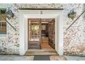 Charming entryway with double doors, offering a glimpse into the modern kitchen at 65 Peachtree Memorial Nw Dr # 5, Atlanta, GA 30309
