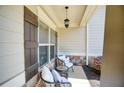 Welcoming front porch with cozy seating, perfect for enjoying quiet mornings and afternoons at 453 Thorn Creek Way, Dallas, GA 30157