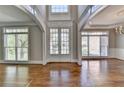 Elegant foyer with hardwood floors and arched entryways at 3237 Birkdale Ave, Duluth, GA 30097