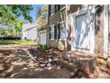 View of the home's front door, garage, and a neatly maintained front yard with some rocks at 3742 Linecrest Rd, Ellenwood, GA 30294