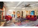 Open-concept living room featuring hardwood floors and arched doorways to other rooms at 1023 Bentley Estates Dr, Dacula, GA 30019