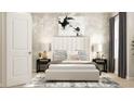 Serene bedroom with white upholstered bed, gray accent wall, stylish lamps and modern decor at 2450 Cotton Ln, Douglasville, GA 30135