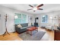 Bright living room featuring a fireplace, hardwood floors, and neutral paint at 108 Glenn St, Decatur, GA 30030