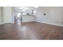 Spacious living room with wood floors and plenty of natural light at 392 Mill Pond Cossing, Carrollton, GA 30116