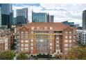 Elegant brick building with charming architectural details, offering stunning city views and a prime location at 77 Peachtree Ne # 507, Atlanta, GA 30309