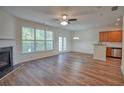 Spacious living room featuring a fireplace, lots of natural light, and hardwood floors at 2241 Nottley Dr # 4, Marietta, GA 30066