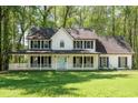 Beautiful two-story home featuring a classic design and inviting front porch at 1061 Retner Dr, Mableton, GA 30126