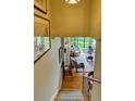 A staircase leading to a bright living room with a wall to wall glass window at 145 15Th Ne St # 1015, Atlanta, GA 30309