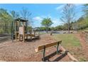 Park view of the playground and picnic area in a well-maintained community park at 310 Oak Leaf Pl, Acworth, GA 30102