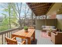 Inviting covered patio with comfortable seating and views of the backyard at 2659 Lakefield Sw Pass, Marietta, GA 30064