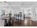 Open-concept living space with hardwood floors, modern decor, and a spacious kitchen at 725 Mcwilliams Se Rd, Atlanta, GA 30315