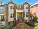 Beautiful brick townhouse with a symmetrical facade and inviting entryway at 2808 Broughton Se Ln, Atlanta, GA 30339