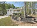 Landscaped yard surrounding the exterior of split-level home at 278 Benjamin Dr, Rockmart, GA 30153