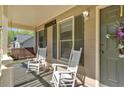Relaxing front porch with comfortable seating, perfect for enjoying the outdoors at 198 Wiley Dr, Douglasville, GA 30134