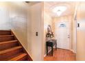 Elegant entryway boasting hardwood floors, a decorative chandelier, and a stylish console table at 2044 Yucca Dr, Decatur, GA 30032