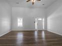 Bright, spacious room featuring high ceilings and hardwood floors, creating a warm and inviting atmosphere at 41 Olde Town Way, Rockmart, GA 30153