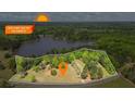Aerial view of a large property highlighting lake access and sunset views at 50 Silver Lake Dr, Mansfield, GA 30055
