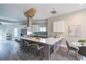 Bright kitchen with a large center island, stainless steel appliances, and an adjacent dining area at 125 Laurel Sw Ave, Atlanta, GA 30314