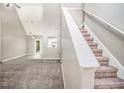 Spacious living room featuring carpet and a staircase at 432 Tanner Farm Dr, Rockmart, GA 30153