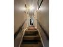 Hallway with carpeted stairs at 1727 Walt Stephens Rd, Jonesboro, GA 30236