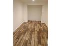 Spacious room featuring newly installed wood-look floors at 2065 Verbena St, Atlanta, GA 30314